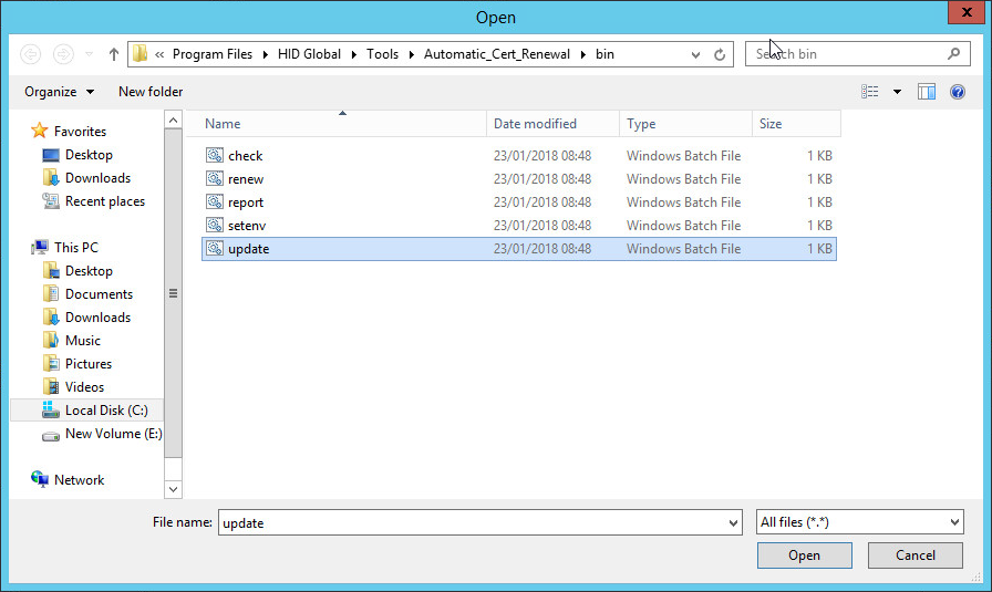 Open dialog box showing an update file selected on the local disk in the Program Files\HID Global\Tools\Automatic_Cert_Renewal\bin directory, with an Open button and a Cancel button at the bottom right of the screen and a Close button in the top right corner
